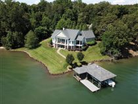 STUNNING LAKEFRONT HOME ON A POINT LOT