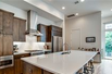THIS BEAUTIFUL HOME OFFERS A ROOFTOP DECK WITH UNOBSTRUCTED DALLAS SKYLINE VIEWS