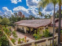 CUSTOM HACIENDA WITH UNIQUE SPANISH CHARM