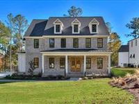 LUXURY RESIDENCE IN CHAMPIONS RETREAT ON THE GOLF COURSE