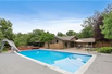TOWN AND COUNTRY ESTATE WITH A MID CENTURY FEEL