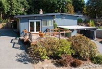 UPDATED MID-CENTURY MODERN HOME IN COVETED NEIGHBORHOOD