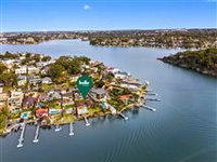 IMMACULATE WATERFRONT FAMILY HOME ON OATLEY BAY