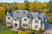 ONE-OF-A-KIND LUXURIOUS ESTATE SITUATED ON OVER AN ACRE