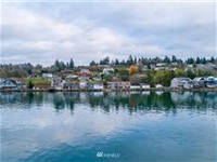 WONDERFUL LOW BANK WATERFRONT HOME WITH EXPANSIVE SOUND VISTAS