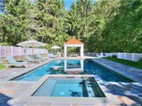 MAGNIFICENT SHINGLE STYLE HOME WITH NO EXPENSE SPARED