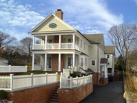 COLONIAL STYLE CONDO WITH A PRIVATE FENCED YARD