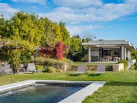 THIS PEACEFUL ARCHITECT-DESIGNED PROPERTY IS SET UPON BEAUTIFULLY LANDSCAPED GROUNDS