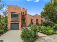 STUNNING SOUTHWESTERN STYLE HOME SET ON A SERENE LANDSCAPED LOT