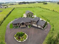 STUNNING AND STYLISH BUNGALOW ON FIVE ACRES OUTSIDE CALGARY