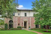 HANDSOME TWO-STORY BRICK HOME