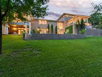 STUNNING MODERN FRANK LLOYD WRIGHT INSPIRED HOME IN WYNDHAM HILL WITH