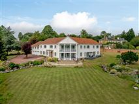 SUBSTANTIAL HOME IN PEACEFUL SETTING