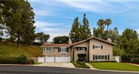 REMARKABLE HOME IS TUCKED AWAY