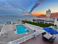 STUNNING CUSTOM BAY-FRONT HOME WITH PANORAMIC VIEWS