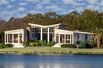 CONTEMPORARY LAKEFRONT MASTERPIECE IN THE HEART OF LANDFALL