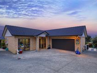 QUIET AND CHARMING SPLIT-LEVEL BRICK HOME