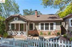 CHARMING HOME TUCKED AWAY ON A QUIET CUL-DE-SAC SURROUNDED BY MAJESTIC OAK TREES