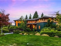 CUSTOM HILLSIDE RETREAT IN LUSH MANICURED SURROUNDINGS