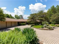 CUSTOM STONE RANCH HOME ON LAKE BUTTE DES MORTS