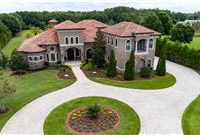 EXQUISITE ESTATE WITH DESIGNER FEATURES AND A BACKYARD OASIS