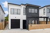 AN EXQUISITELY CRAFTED BRAND-NEW HOME