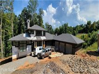 GRAND MODERN HOME IN THE CLIFFS AT WALNUT COVE