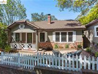 CHARMING HOME TUCKED AWAY ON A QUIET CUL-DE-SAC SURROUNDED BY MAJESTIC OAK TREES