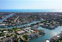 ABSOLUTELY FABULOUS MODEL PERFECT WATERFRONT TOWNHOME