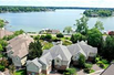 ENJOY LAKEFRONT CONDO LIVING ON EXVLUSIVE PINE LAKE