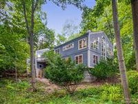 STUNNING CUSTOM-BUILT CONTEMPORARY BACKING TO HILLWOOD COMMUNITY PRESERVE