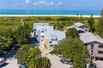 GORGEOUSLY UPDATED HOME ON THE SANDS OF SIESTA BEACH