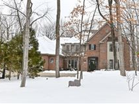 BEAUTIFULLY APPOINTED SPACIOUS HOME WITH A SCREENED-IN GAZEBO