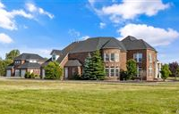 CUSTOM BRICK ESTATE MASTERPIECE WITH TIMELESS STYLE