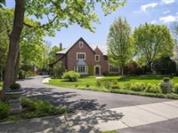 BUILT IN 1929, STATELY BRICK MANOR WITH COACH HOUSE