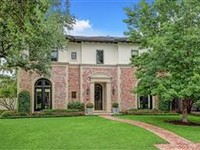 HANDSOME TWO-STORY BRICK HOME