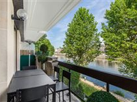 PEACEFUL APARTMENT WITH A BALCONY ENJOYING A VIEW OF THE SEINE
