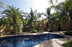 INVITING PROPERTY SURROUNDED BY LUSH GARDENS