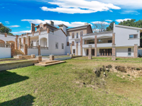 PARTIALLY FINISHED ARCHITECT DESIGNED MANSION