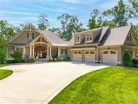 STUNNING LAKEFRONT CUSTOM HOME