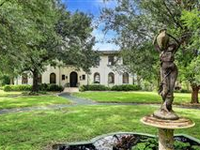 DAVIS HOME SITUATED ON OVER AN ACRE OF BEAUTIFULLY LANDSCAPED GROUNDS