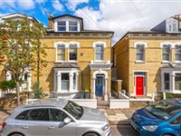 EXTREMELY ELEGANT AND WELL-PROPORTIONED FOUR-STORY HOME