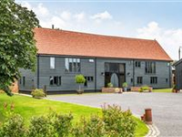 STUNNING CONTEMPORARY BARN CONVERSION SET ON BEAUTIFUL GARDENS