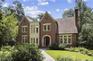 CUSTOM-BUILT BRICK HOME IN BELOVED DUCK POND NEIGHBORHOOD