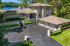 PRISTINE LAKEFRONT HOME WITH DESIGNER FINISHES