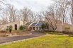 UNIQUE CONTEMPORARY ON THREE WOODED ACRES
