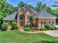 IMPRESSIVE LAKE NORMAN WATERFRONT HOME INCLUDES A BEAUTIFULLY LANDSCAPED YARD