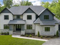 JUST COMPLETED NEW CONSTRUCTION IN COVETED LOCATION