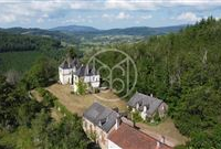 CASTLE IN MAGNIFICENT FOREST LANDSCAPE