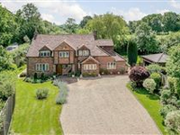SPACIOUS COUNTRY HOME SET ON IDYLLIC GROUNDS
